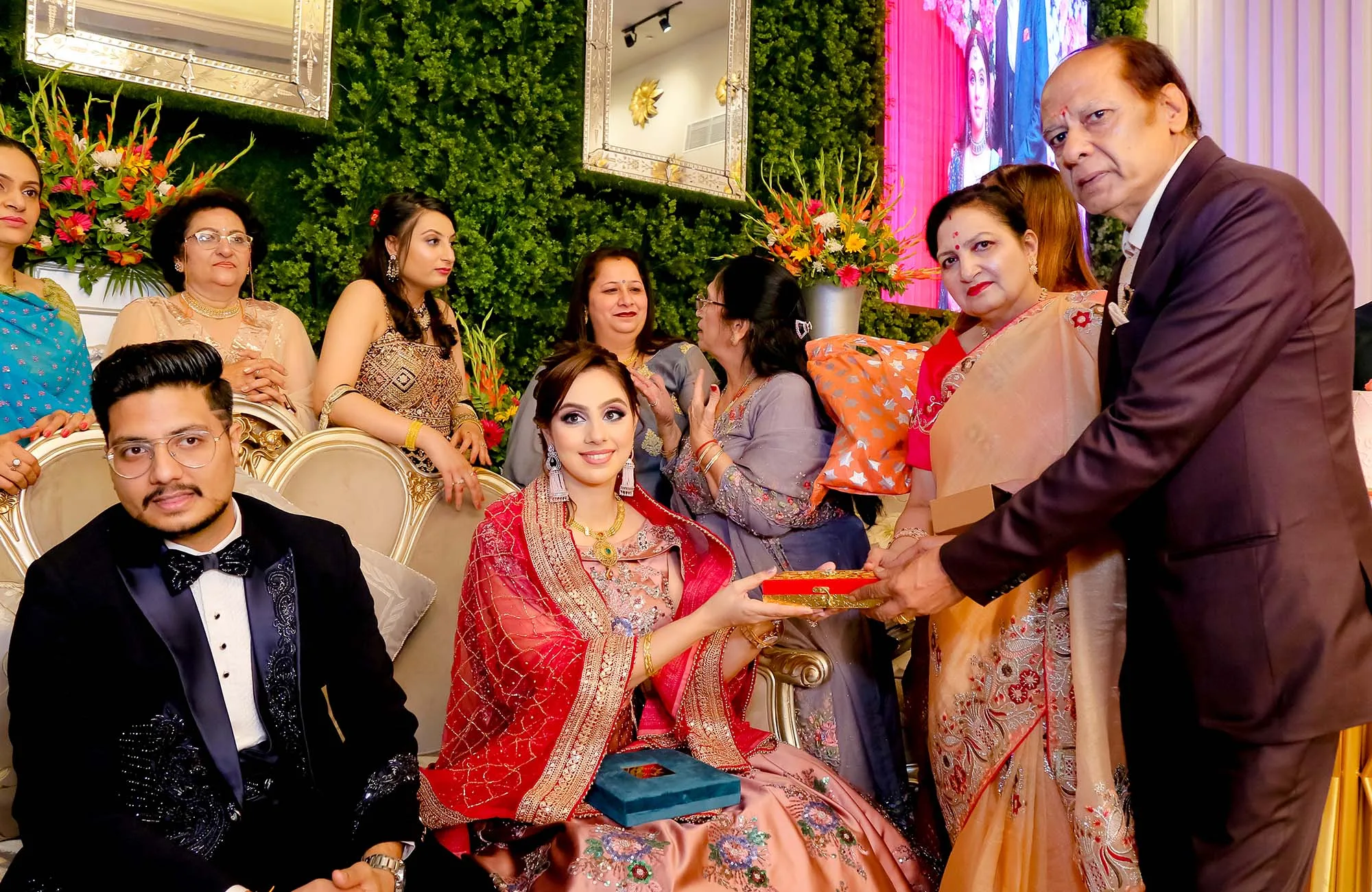 bride sitting ceremony candid family wedding photography faridabad